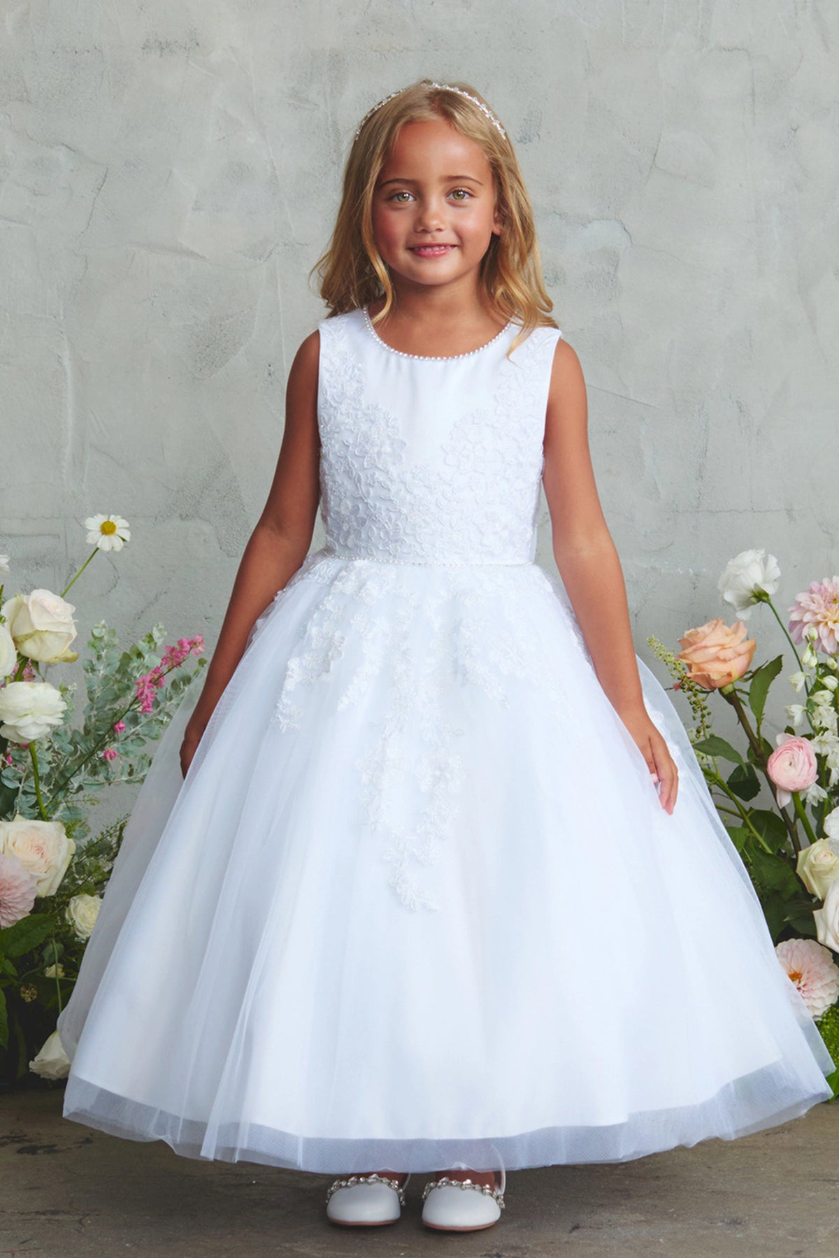 White flower girl dress with a full lace skirt.