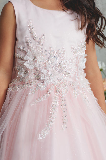 Rhinestone leaf sprays are visible on the blush flower girl dress.