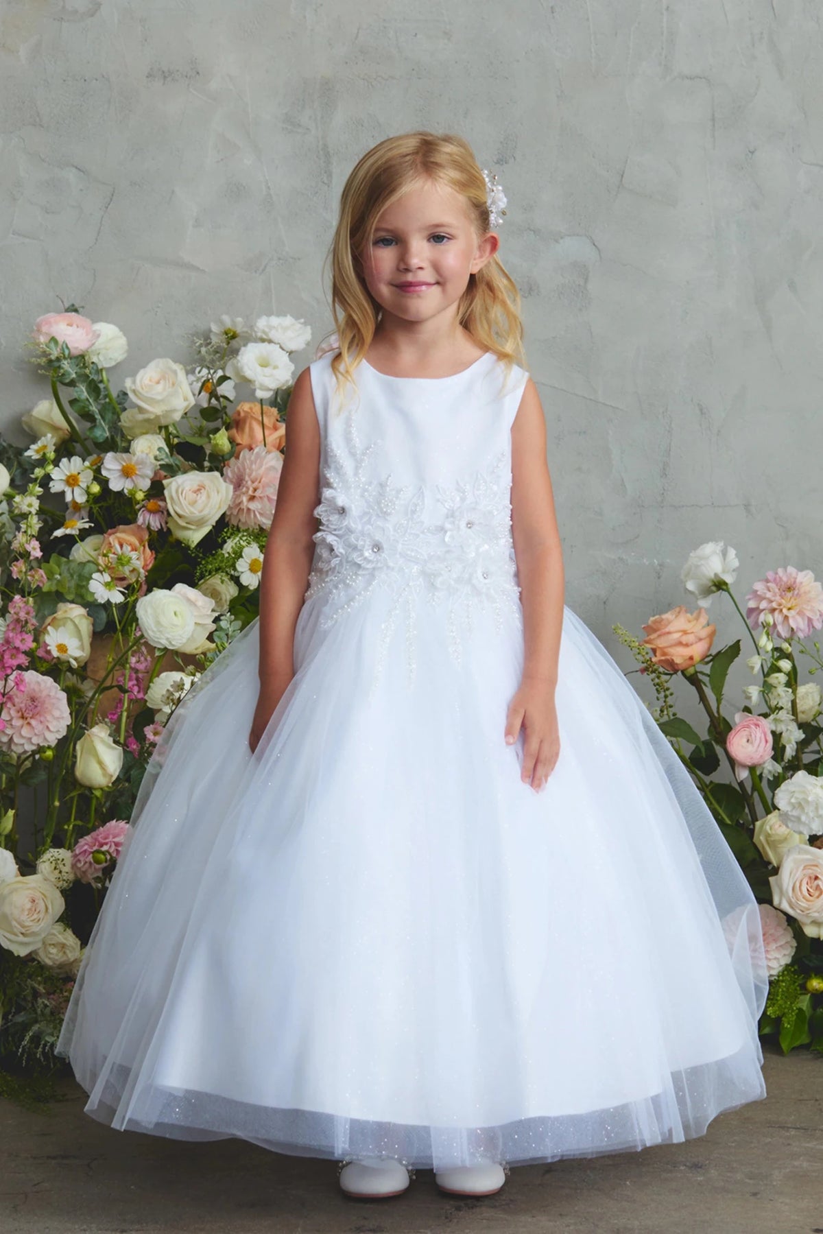 Floral waist ornament is visible on the white flower girl dress.