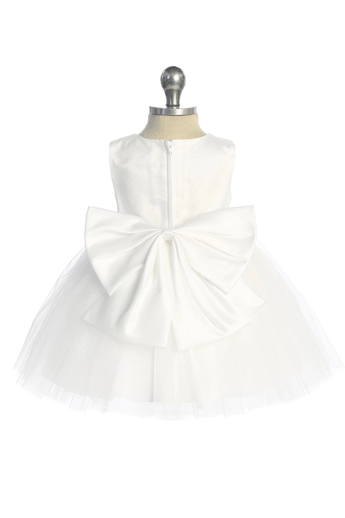 Defined by a large rear bow, this white flower girl dress.