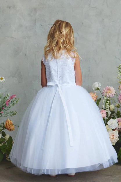 White flower girl dress detailed with a slender satin sash.