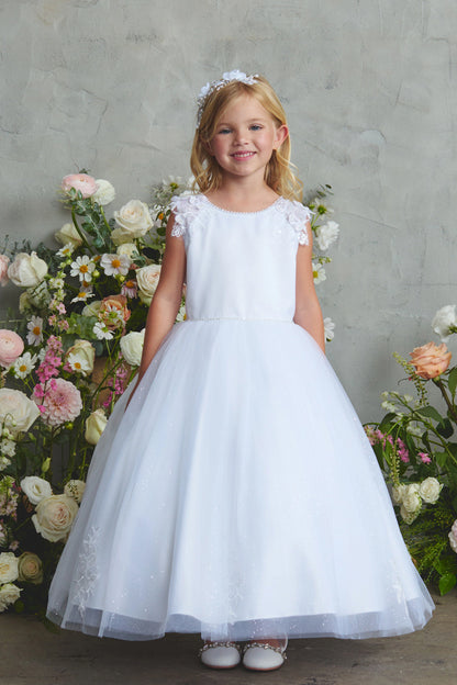 White flower girl dress, showing 3D shoulder flowers.