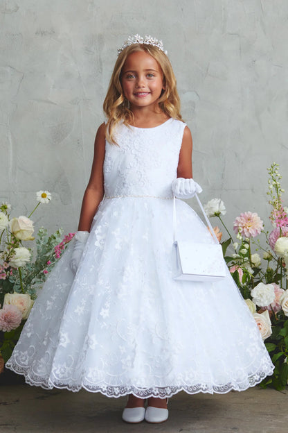 Lace-trimmed skirt is visible on the white flower girl dress.