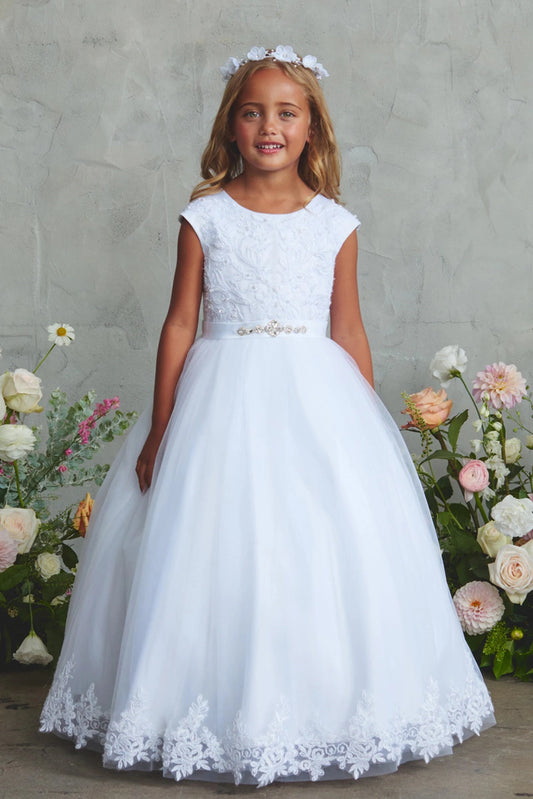 White flower girl dress detailed with a floral lace hem.