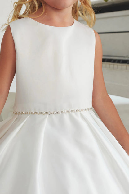 This white flower girl dress displays a fine beaded waistband.