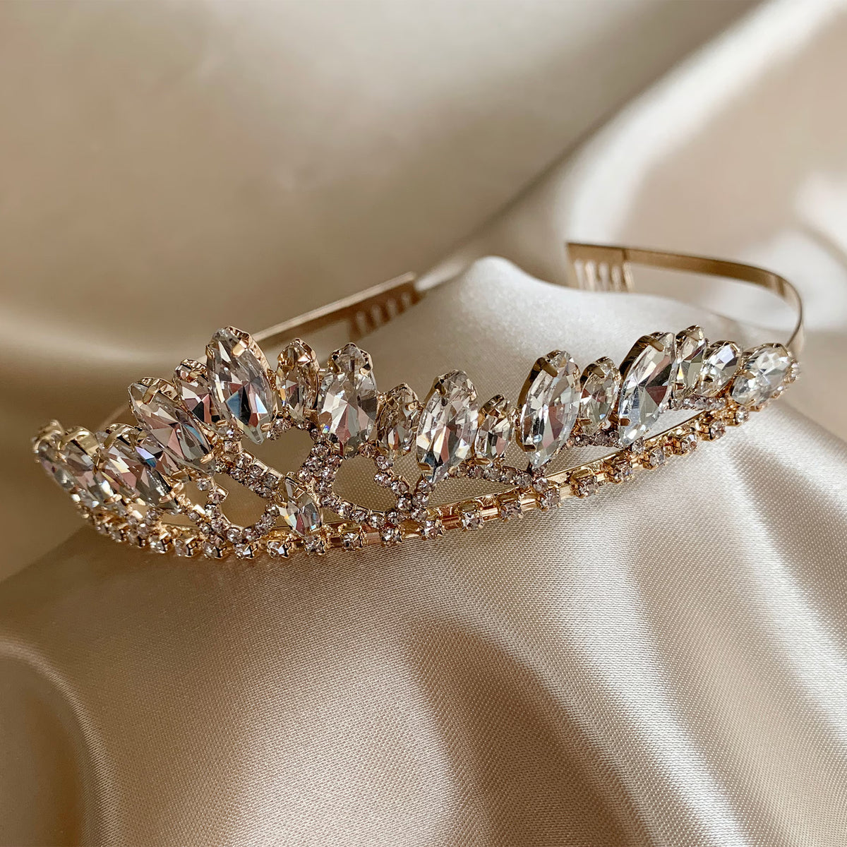 Gold rhinestone flower girl tiara, side view.