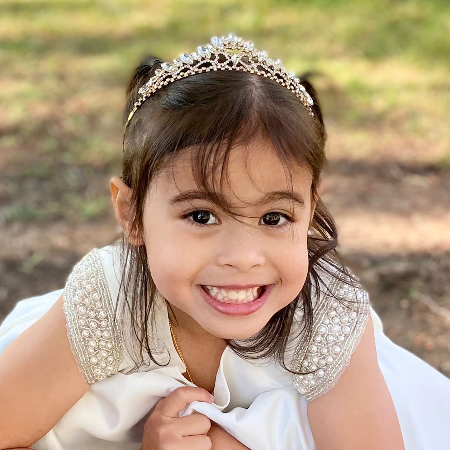 Silver rhinestone flower girl tiara.