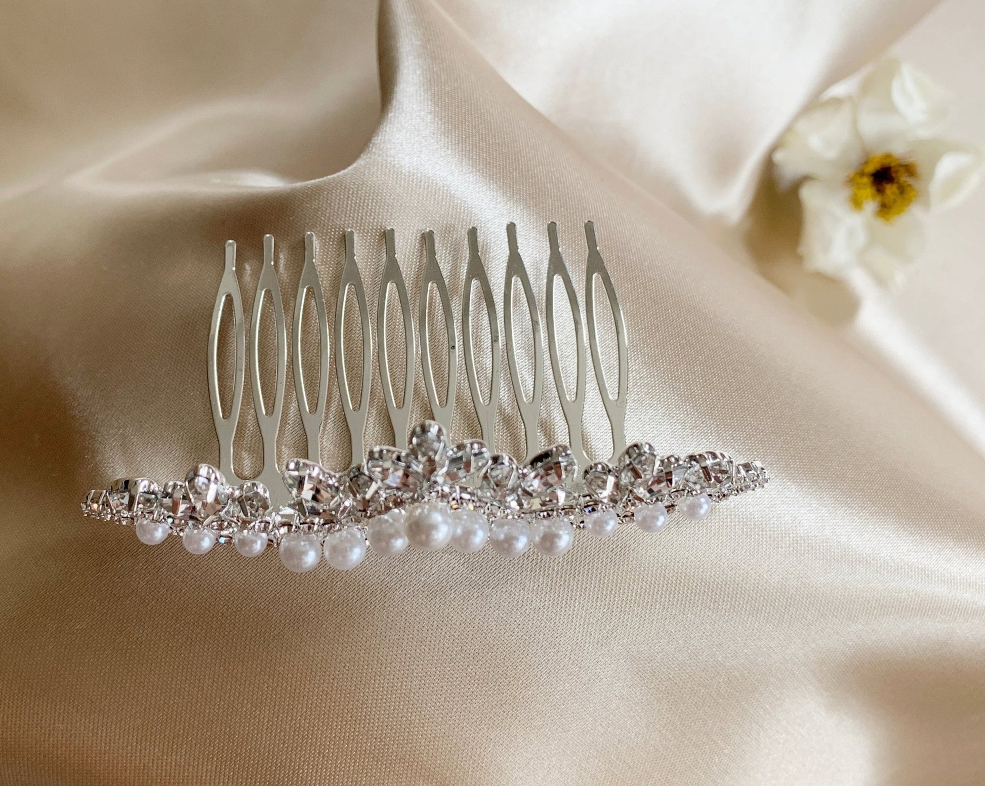 Clear pearl rhinestone flower girl and mini quince tiara comb, close-up, comb detail, embellishment detail.