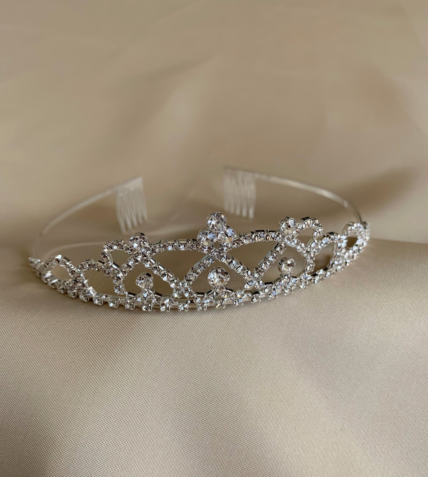 Silver rhinestone flower girl tiara, front view.