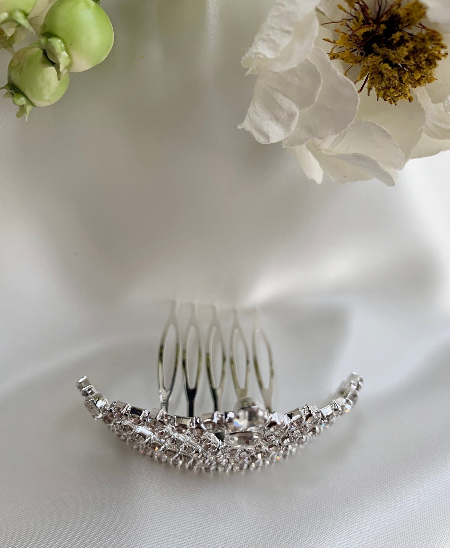 Silver rhinestone flower girl tiara comb, top view, comb detail.