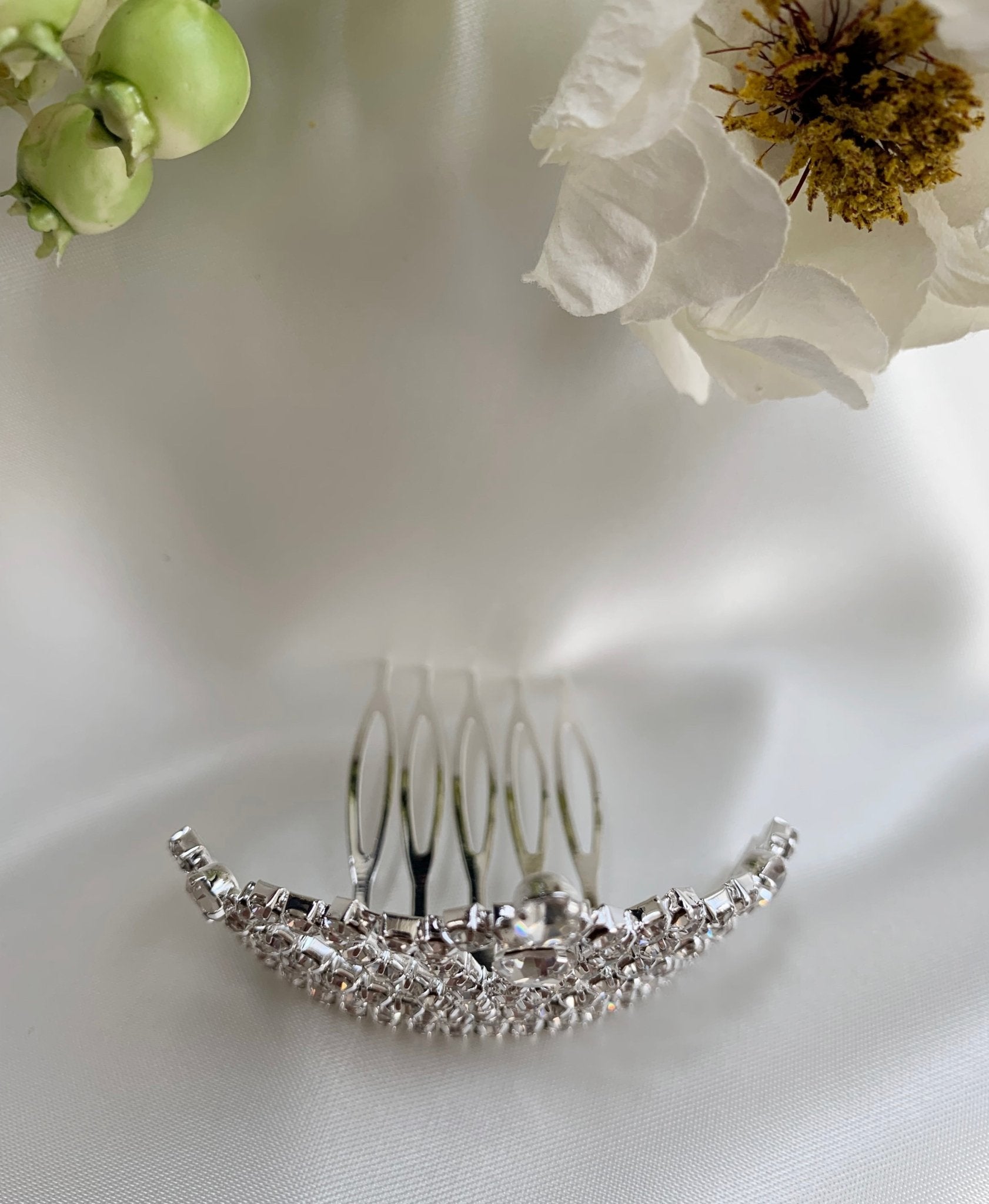 Silver rhinestone flower girl tiara comb, top view, comb detail.