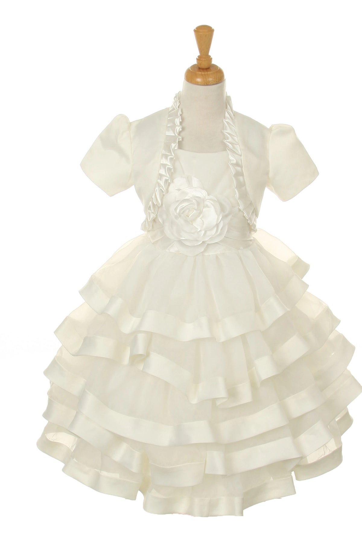 Detailed by horizontal skirt ruffles, the Ivory kids party dress reveals its construction.
