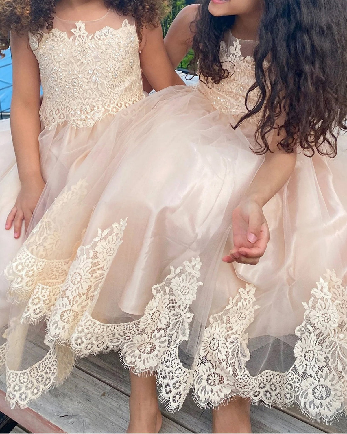 Front view of champagne Elegant flower girl dress with Beaded Lace and Tulle Skirt.