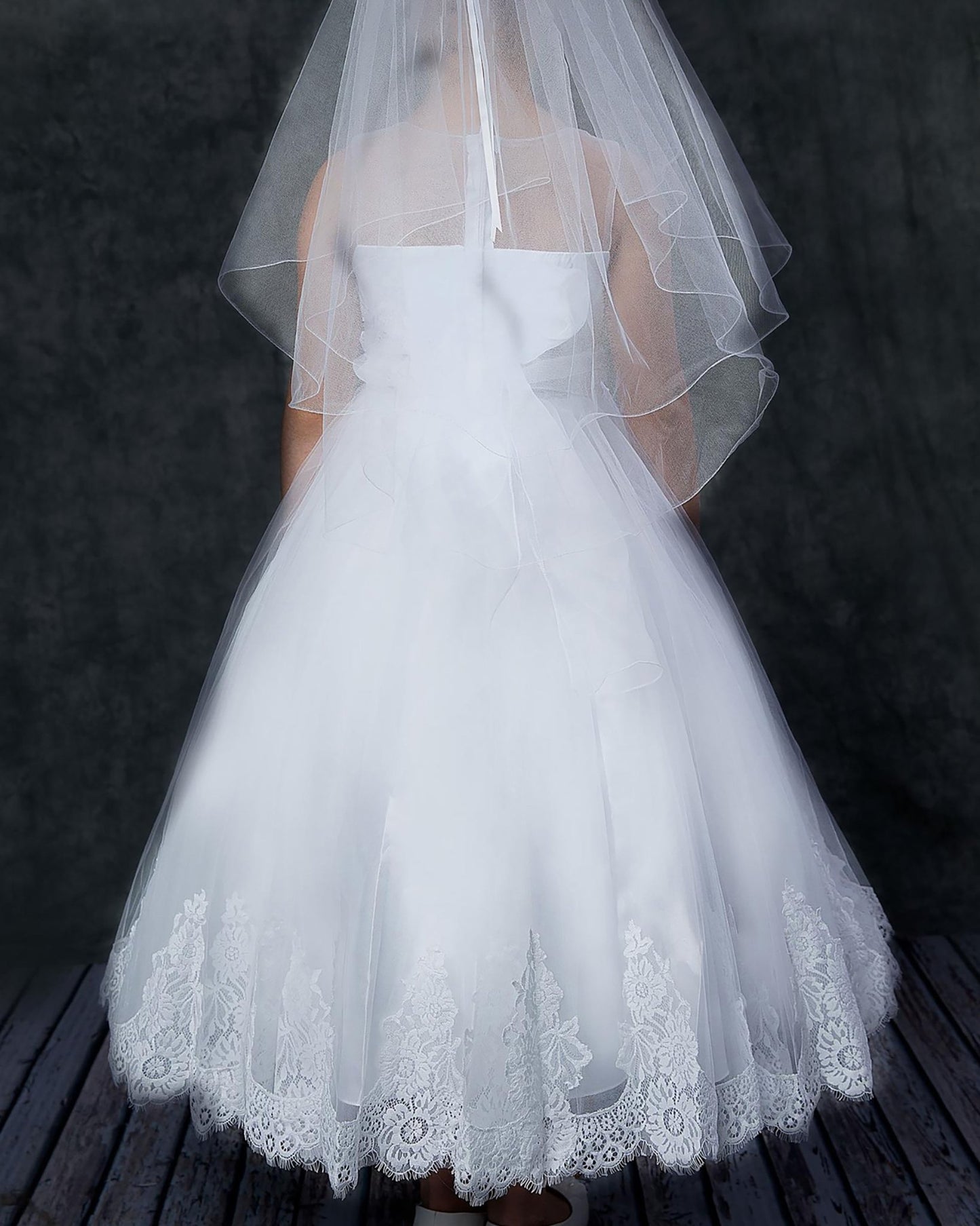 White lace communion dress.