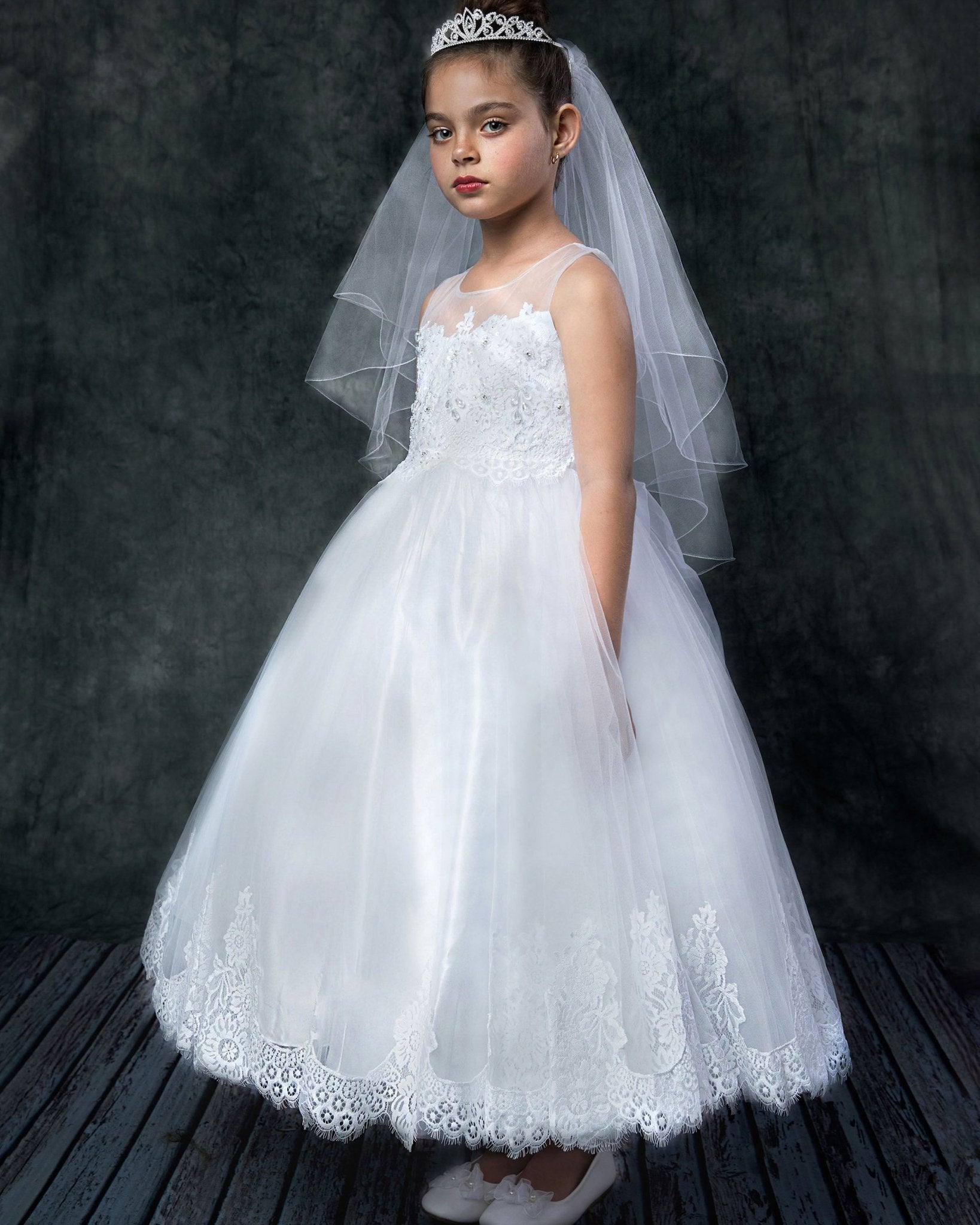 A white lace communion dress.