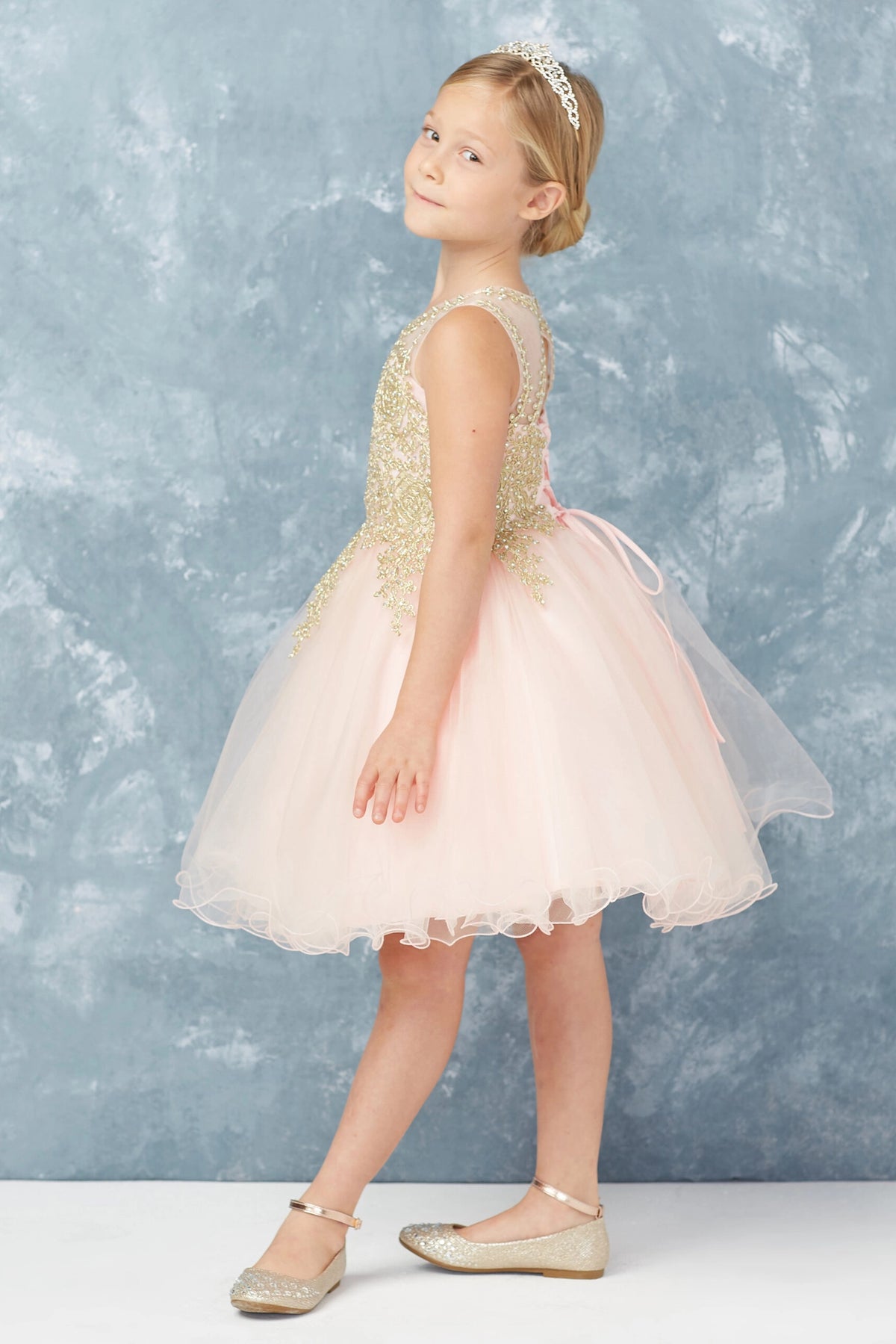 The Blush kids pageant dress has metallic floral lace.