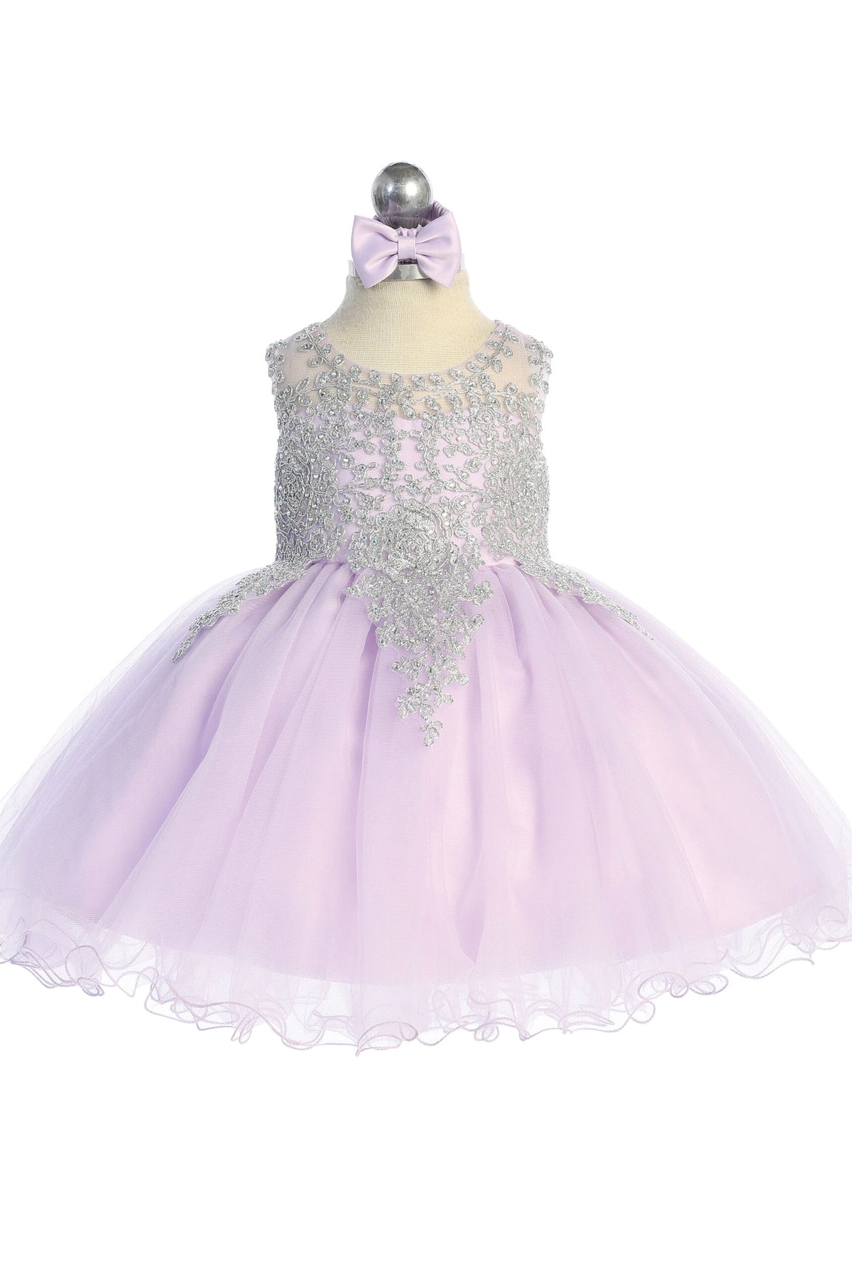 The Lilac kids pageant dress has metallic floral lace.