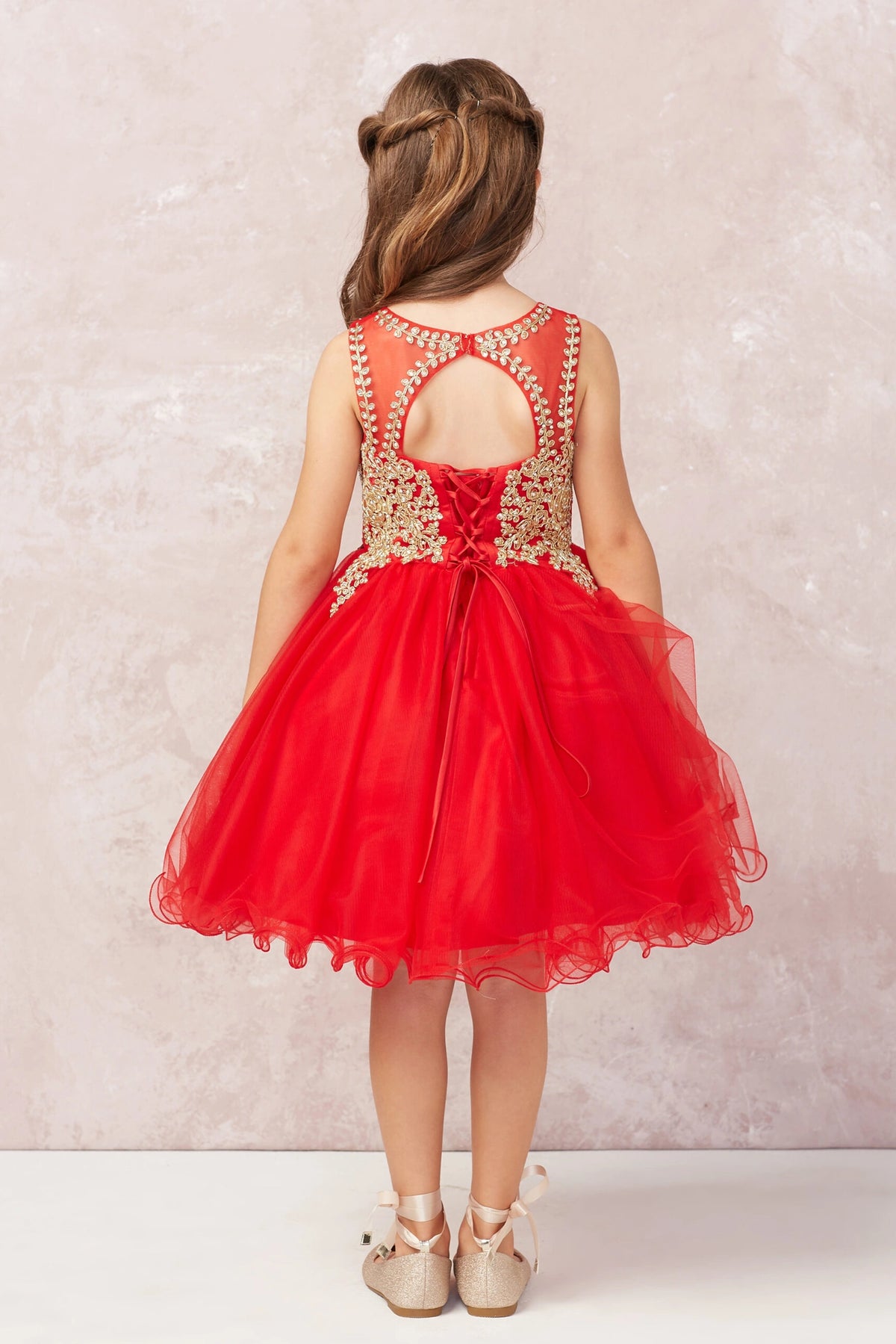 The Red kids pageant dress has a tied sash across the back waist.