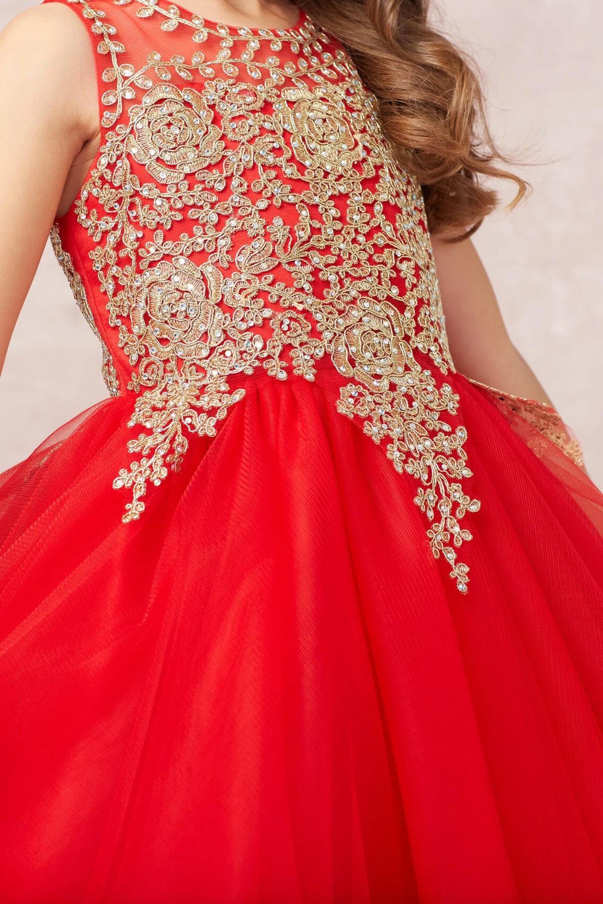 Visible details on the Red kids pageant dress include gold lace below the neckline.