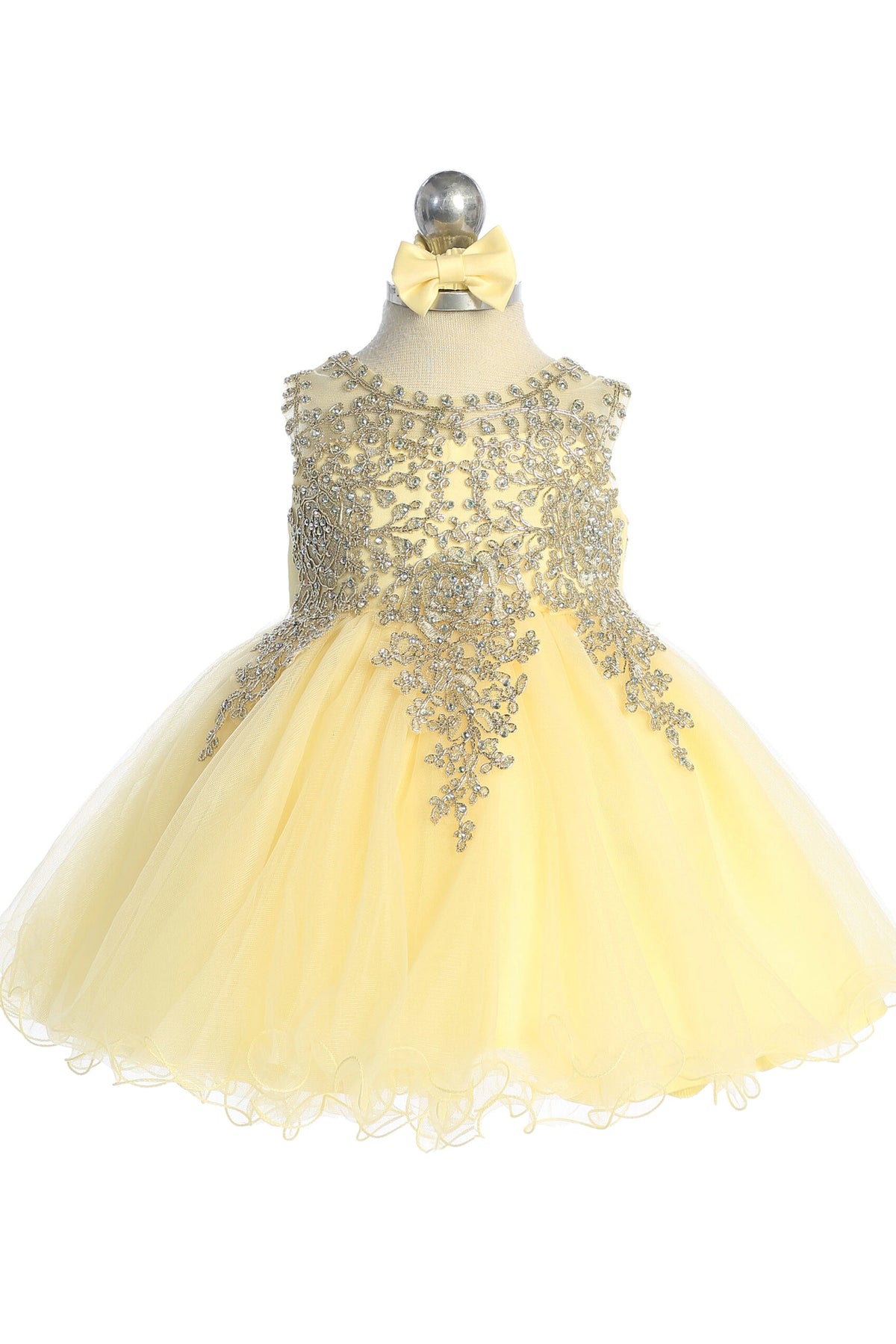 The Yellow kids pageant dress has metallic floral lace.
