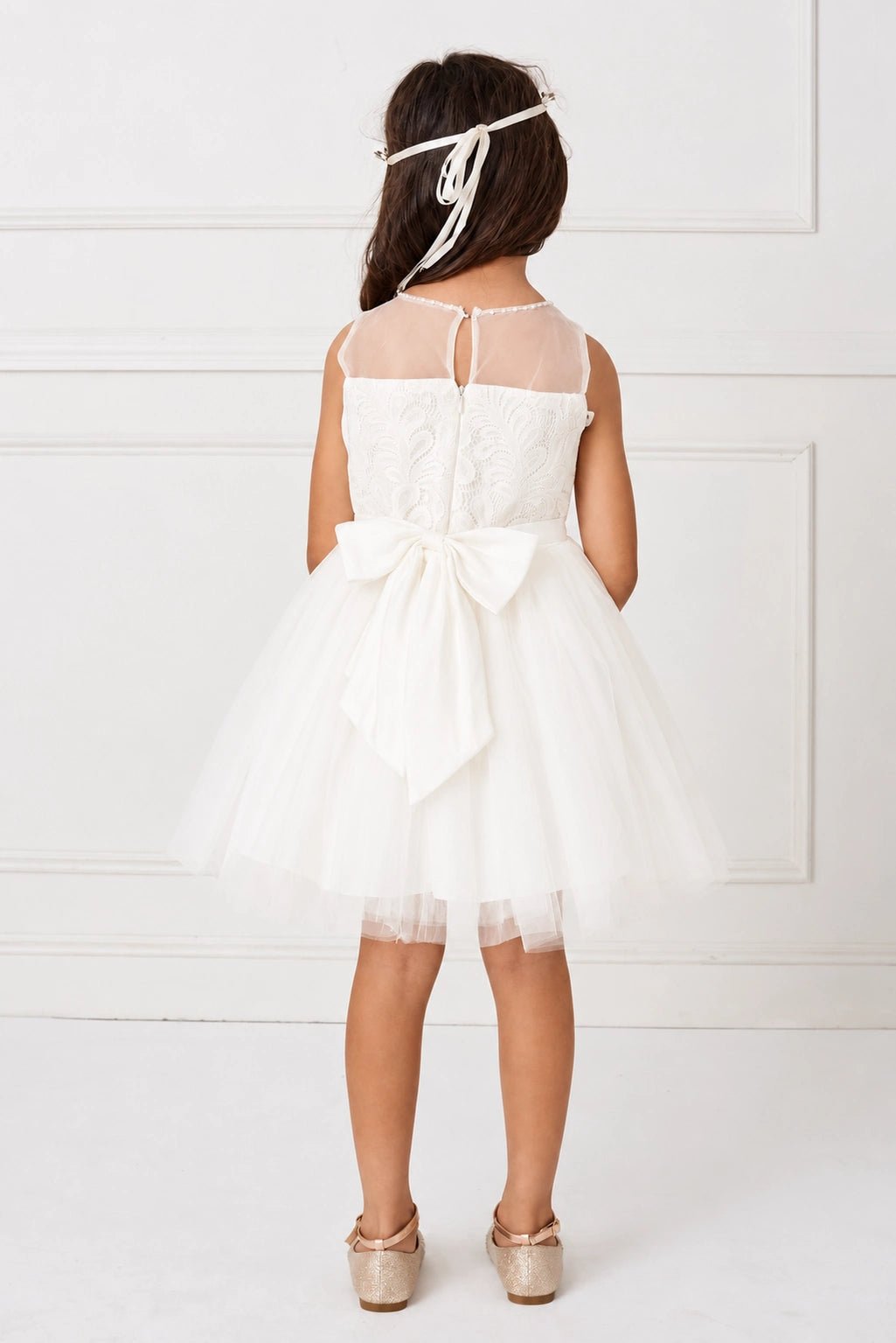 Off-White flower girl dress with a large satin back bow.