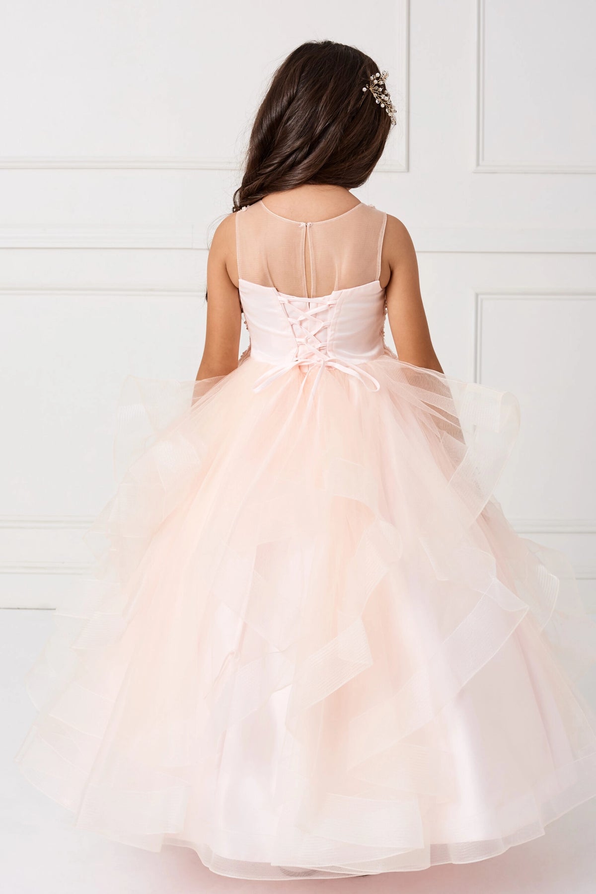 Visible details on the Blush kids pageant dress include lace-up ties at the back.