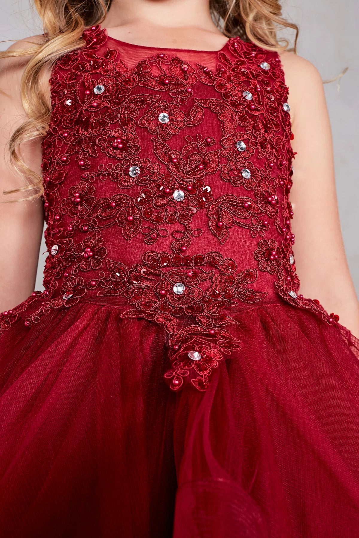 Visible details on the Burgundy kids pageant dress include beaded floral lace.