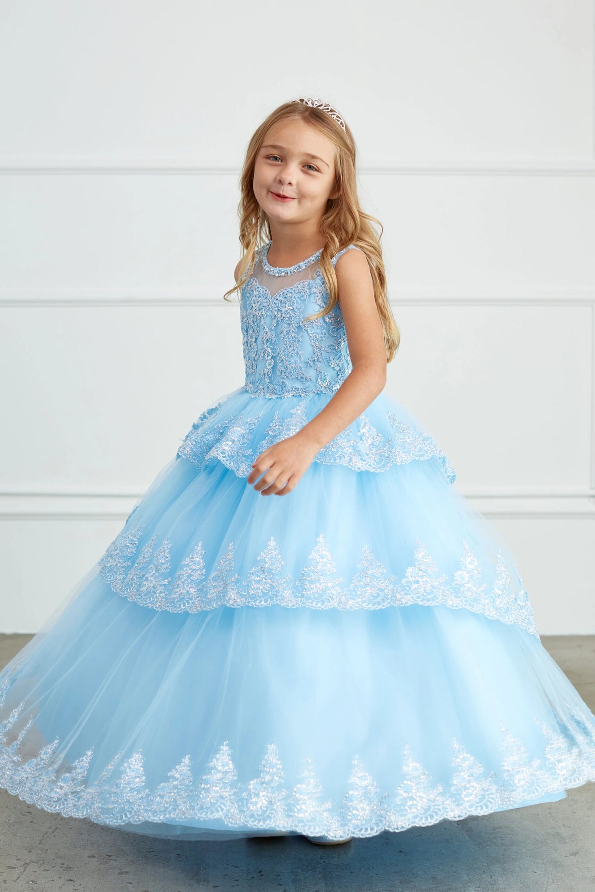Sky Blue kids pageant dress featuring corded lace edging on layered tulle.