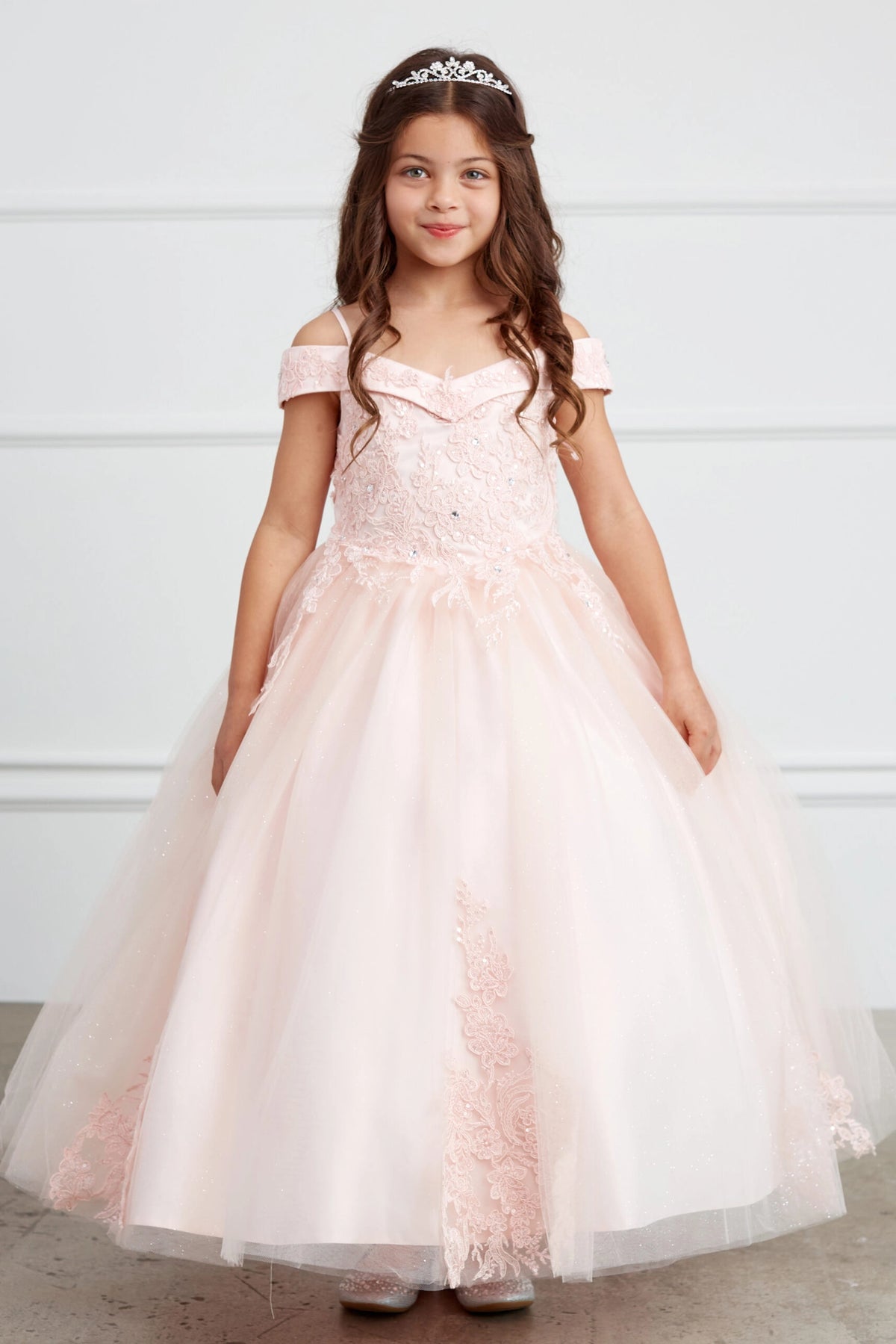 The Blush kids pageant dress has corded floral lace.