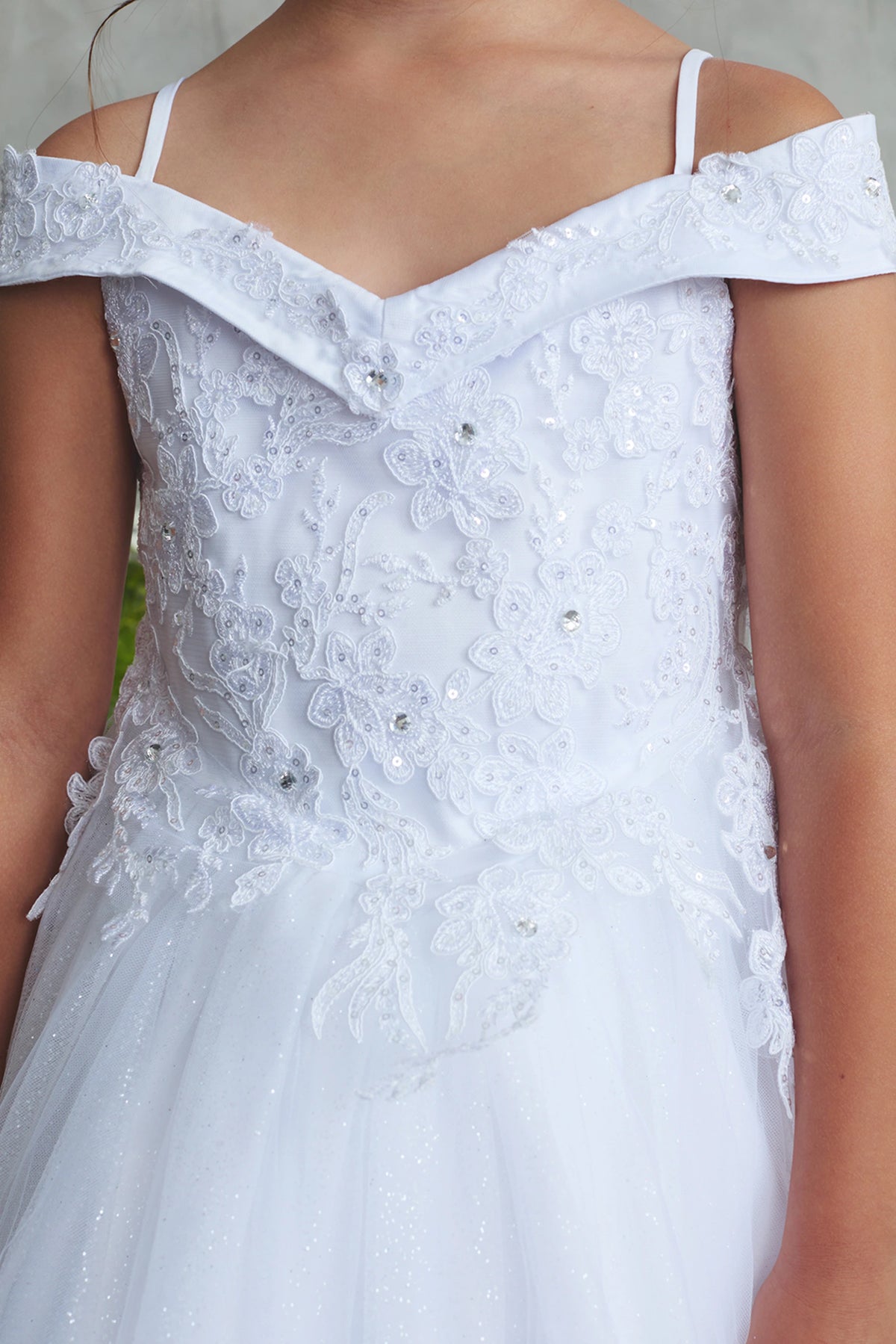 Seen from the front, this White kids pageant dress displays corded floral lace.