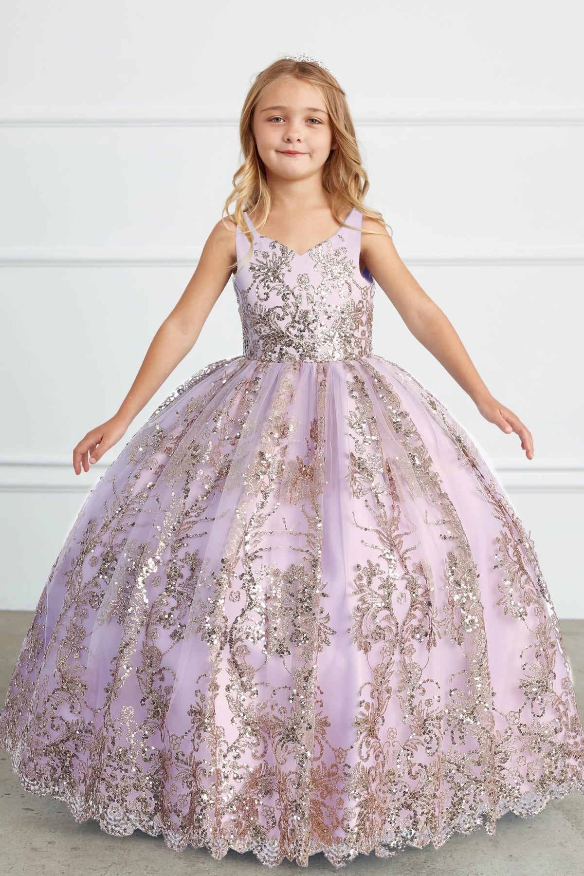 The Lilac kids pageant dress has floral glitter lace.
