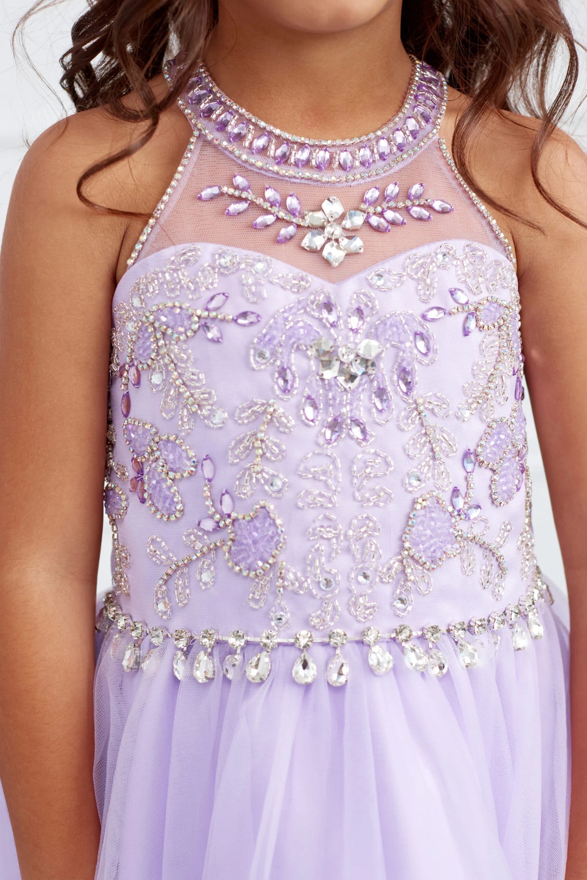 The Lilac kids pageant dress has beaded trim at the choker neckline.