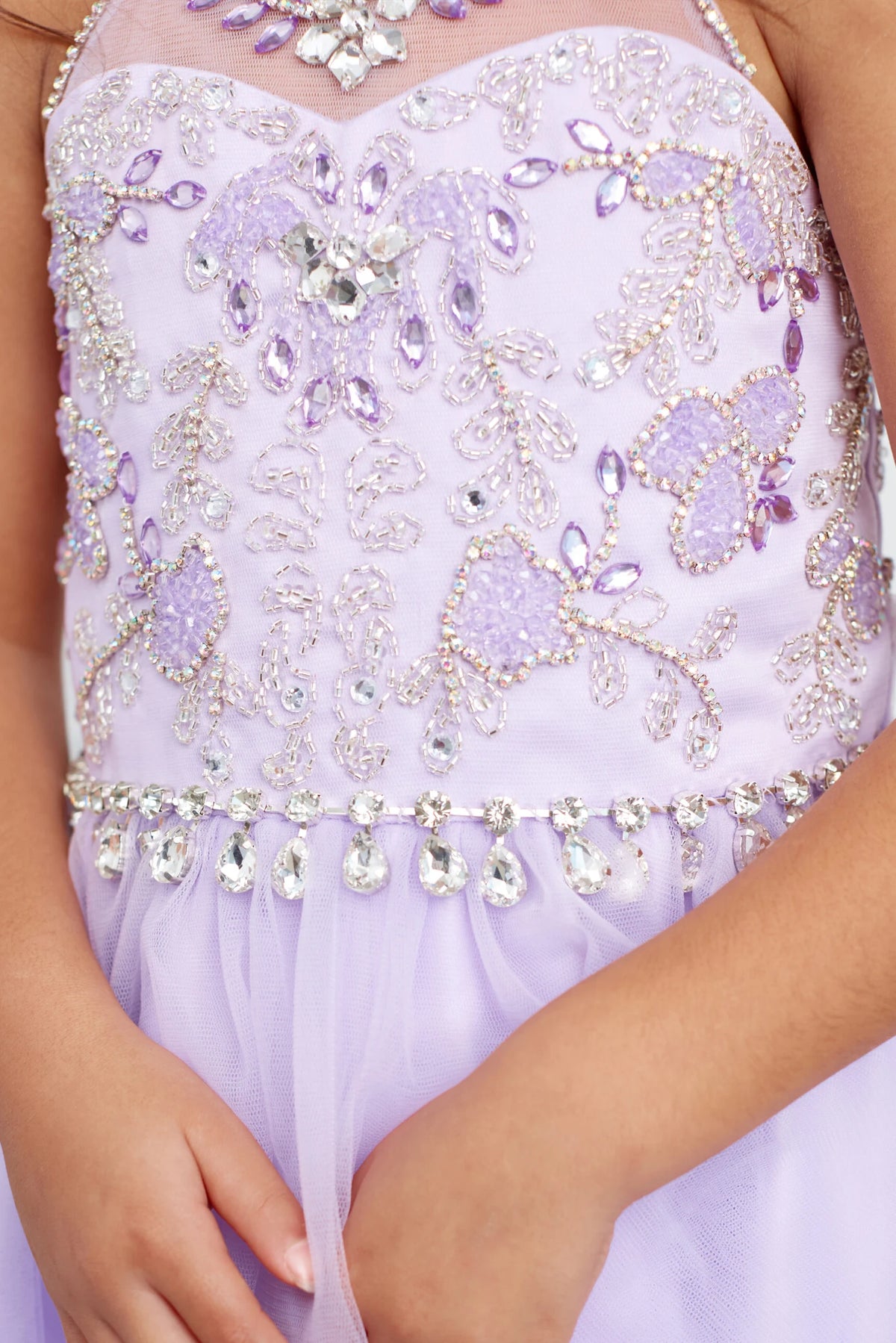 Visible details on the Lilac kids pageant dress include rhinestone details across the bodice.