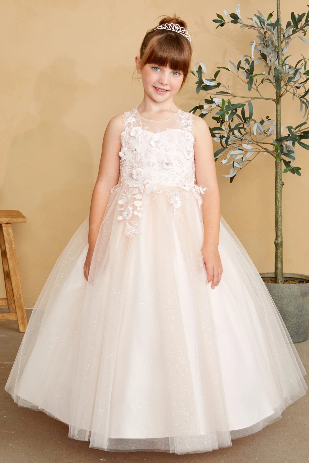 Blush kids pageant dress featuring dimensional floral lace.