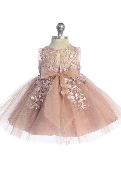 Seen from behind, this Dusty Rose kids pageant dress displays a tied sash across the back waist.