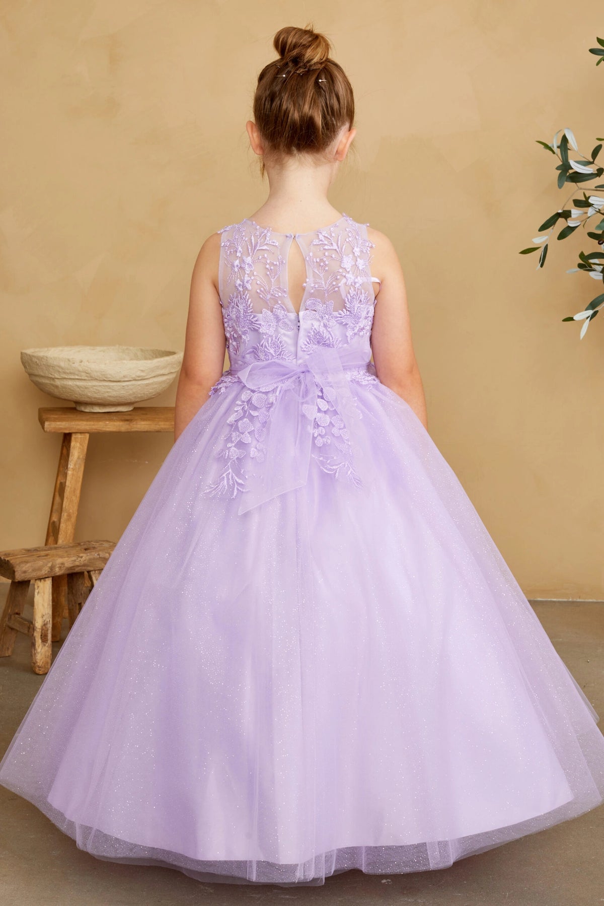 The Lilac kids pageant dress has a tied sash across the back waist.