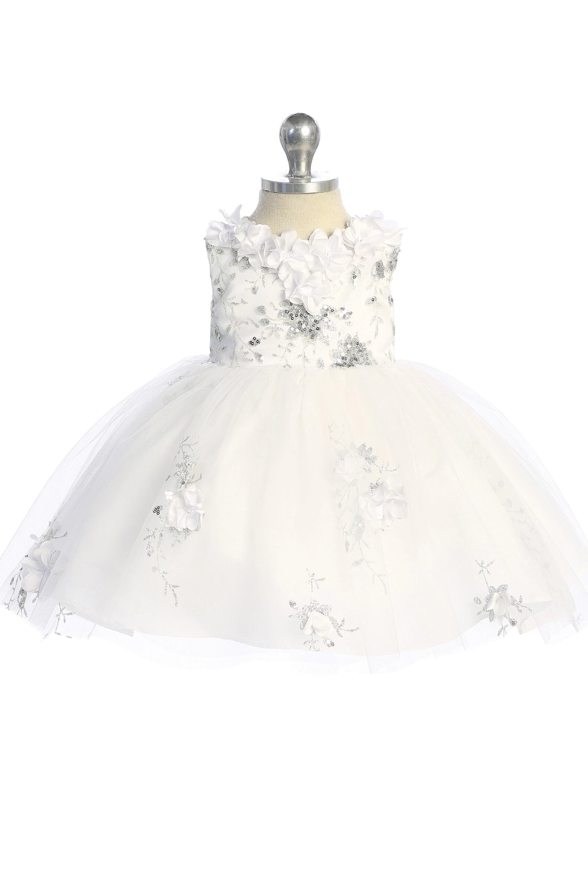 The White kids pageant dress has three-dimensional flower appliques.