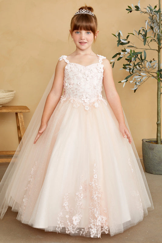 Blush kids pageant dress featuring floral appliques on a full tulle skirt.