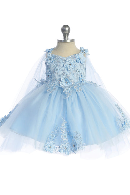 Seen from the front, this Sky Blue kids pageant dress displays floral appliques on a full tulle skirt.