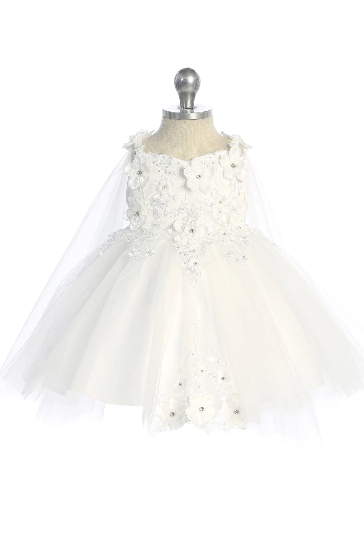 The White kids pageant dress has floral appliques on a full tulle skirt.