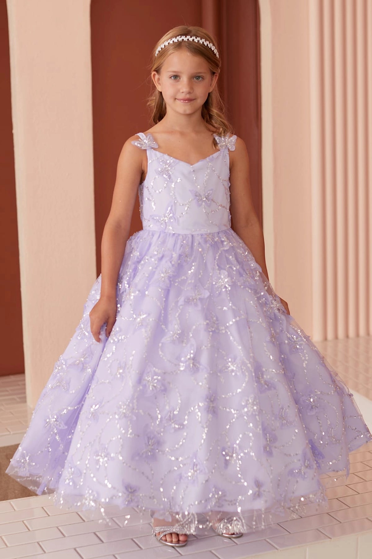 Lilac kids pageant dress featuring raised butterfly details.