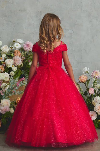 Red kids pageant dress featuring a tied sash across the back waist.