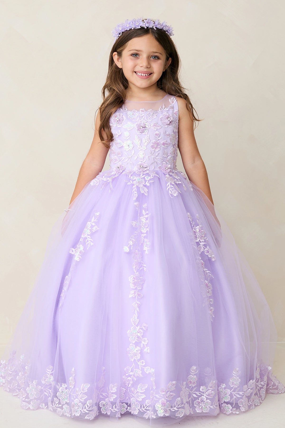 Another view of the Lilac kids pageant dress shows lace appliques across the bodice and skirt.
