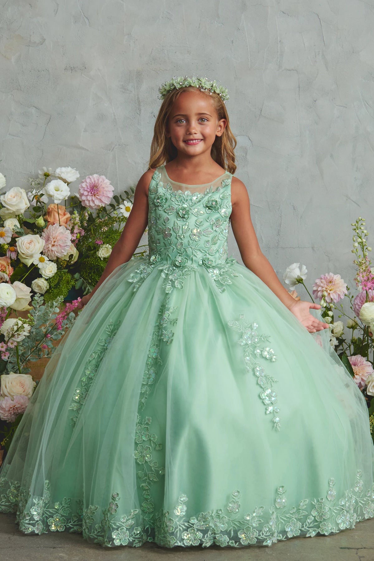 Sage kids pageant dress featuring lace appliques across the bodice and skirt.
