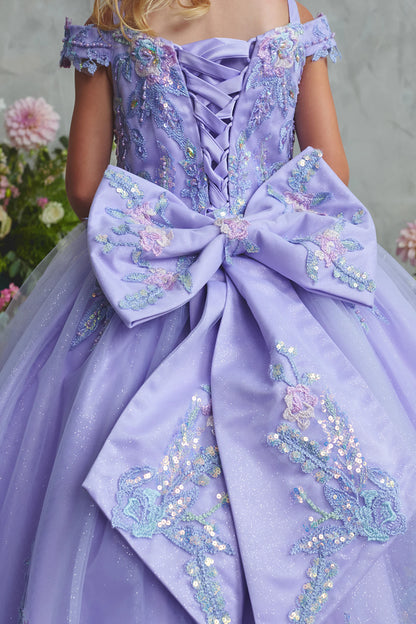 Seen from up close, this Lilac kids pageant dress displays an oversized bow across the back waist.