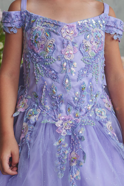 On the Lilac kids pageant dress, the detailing includes multicolor lace over the bodice.