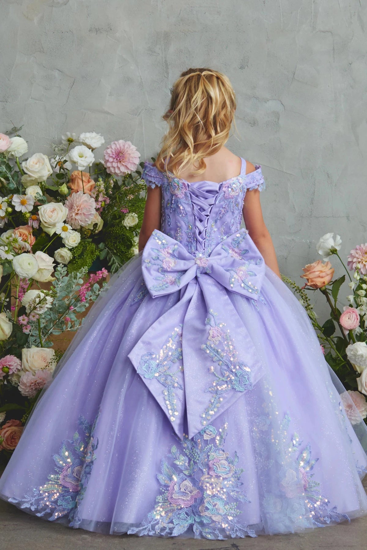 Another view of the Lilac kids pageant dress shows lace-up ties at the back.