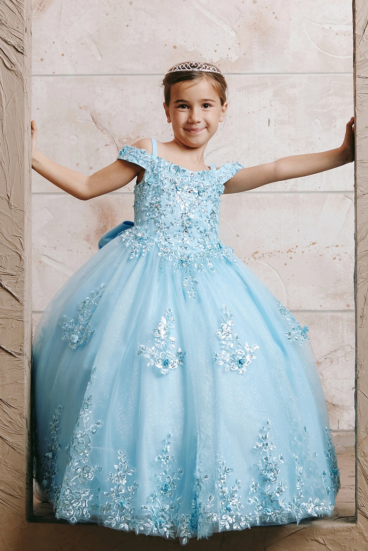 Sky Blue kids pageant dress featuring lace appliques on a glitter tulle skirt.