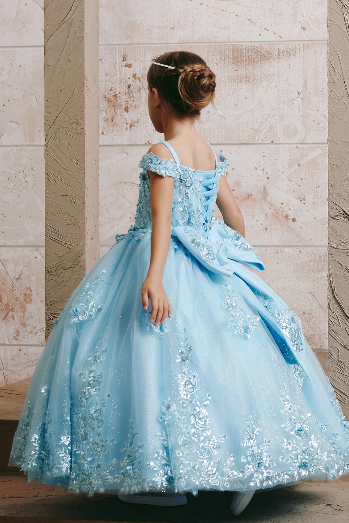 The Sky Blue kids pageant dress has lace-up ties at the back.
