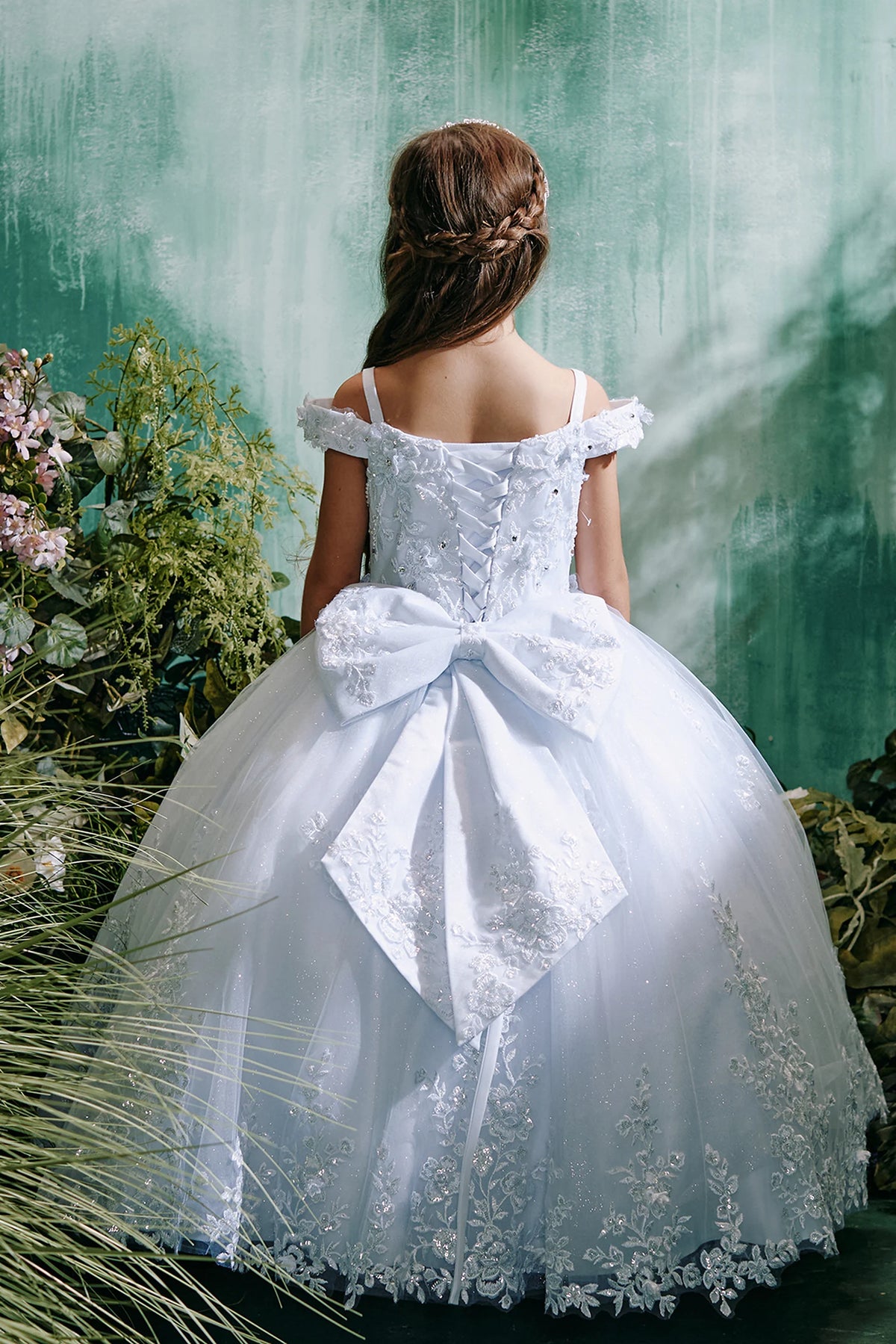 Visible details on the White kids pageant dress include lace-up ties at the back.